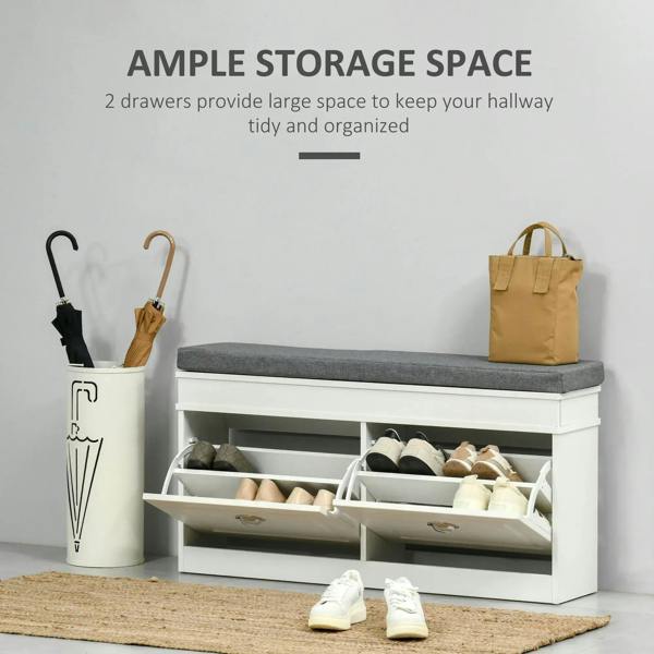 White shoe storage bench with gray seat cushion and flip drawers open for shoe storage