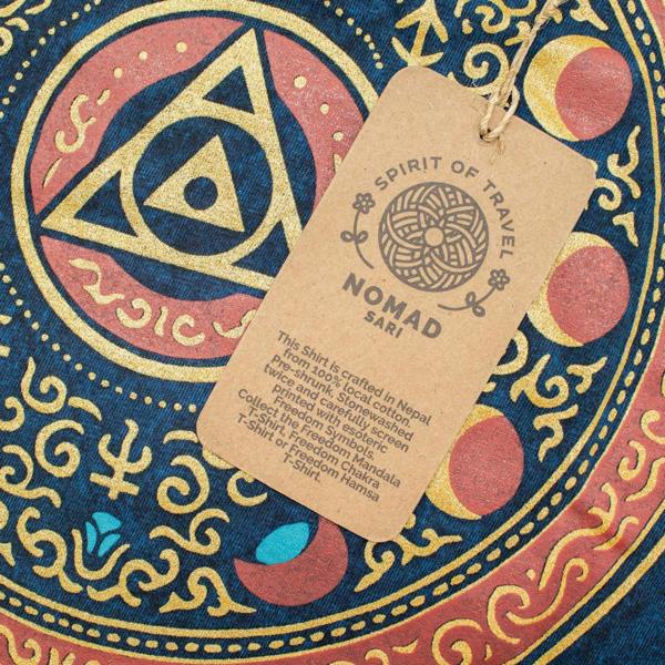 Clothing tag attached to blue t-shirt featuring circular graphic design
