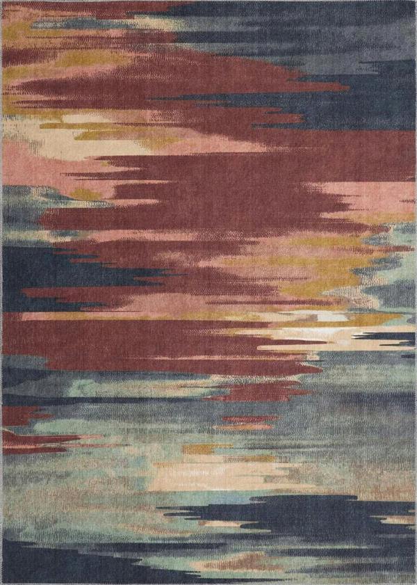 Multicolored abstract patterned rug with shades of blue, pink, and yellow.