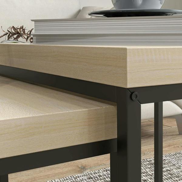 Oak-look tabletop and black steel frame corner detail for nested table set