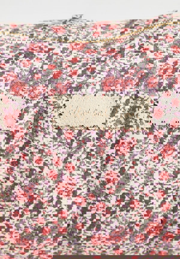 Vintage print wash bag in pink