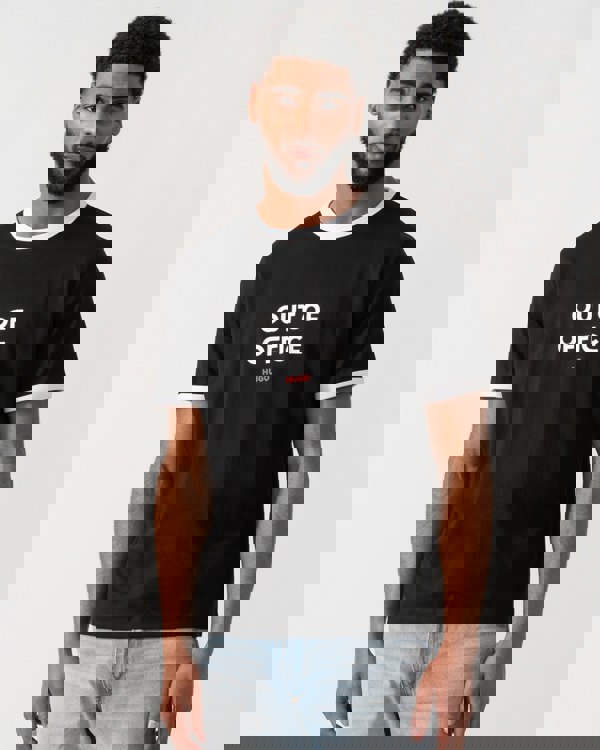 model wearing a HUGO Doffice Mens T-Shirt in Black