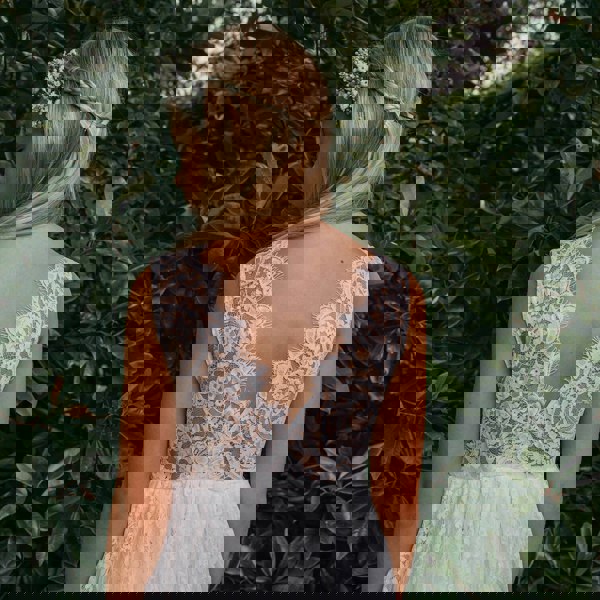 lace back on a white glower girl dress