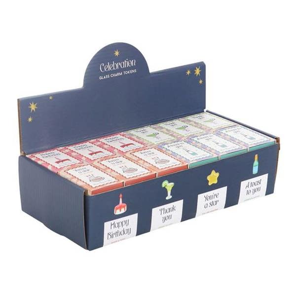 Open blue display box of glass charm tokens with rows of card inserts.