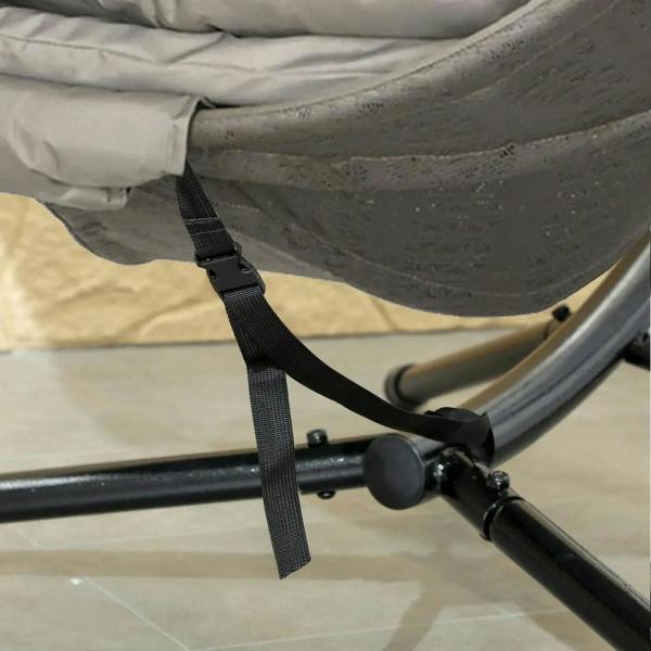Secure safety strap on round egg basket chair seat, with black base arm visible