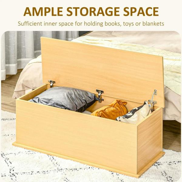 Burlywood storage chest with flip-top lid open, holds pillows and blankets inside