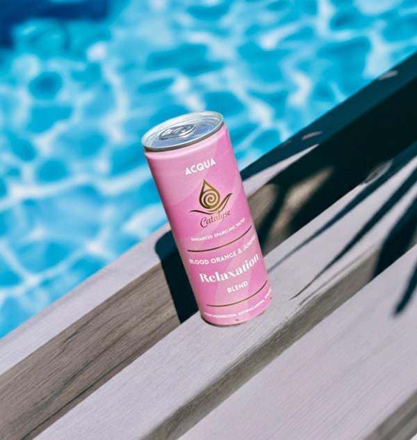 Acqua relaxation drink with blood orange and juniper, inspired by forest bathing and mindful rituals.