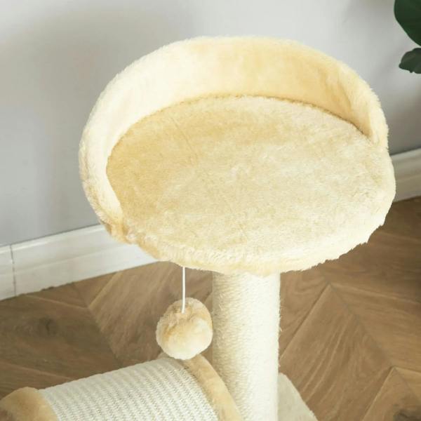 Beige cat tree top perch with hanging ball and sisal support post close-up