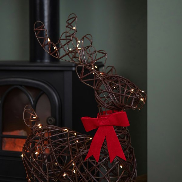 Samuel Alexander 60cm Battery Operated Light up Christmas Reindeer with Red Bow & Warm White LEDs