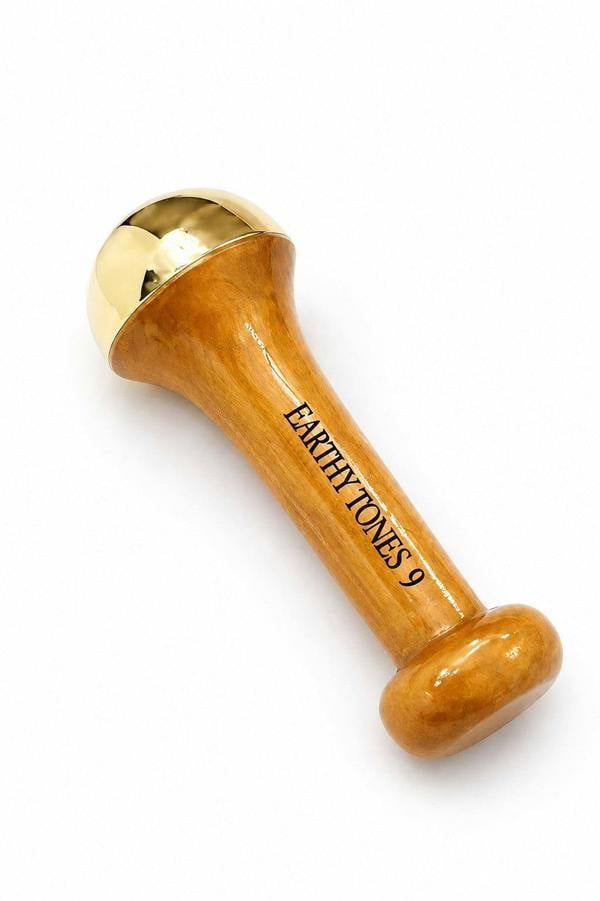 Earthy Tones 9 Kansa Wooden tool with gold top on a white background, branded 'Earthly Jones'.