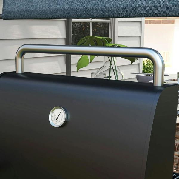 Black BBQ grill lid with thermometer dial and arched front handle