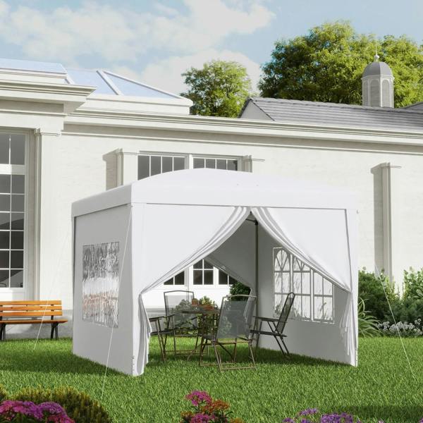 White pop-up gazebo canopy tent with draped doorway curtains and window panels