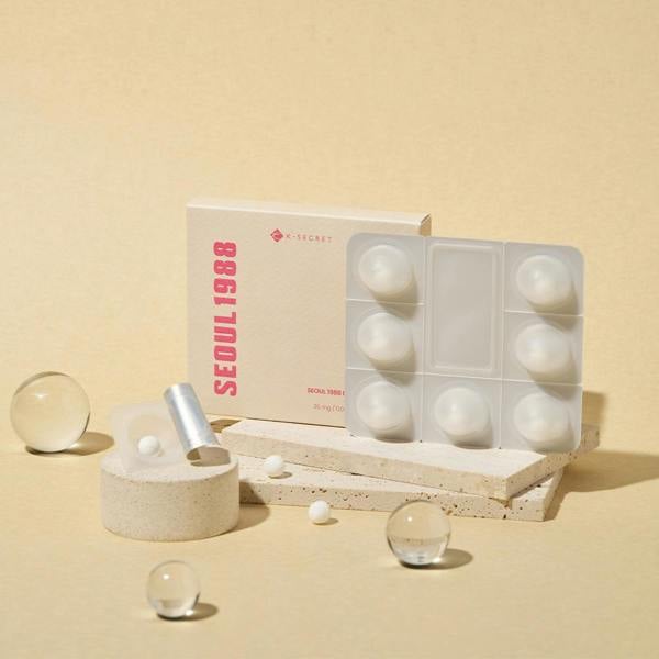 Dissolving process of KSECRET SEOUL 1988 100% Collagen Boosting Ball mixing instantly with a liquid active serum at Atelier De Glow UK.