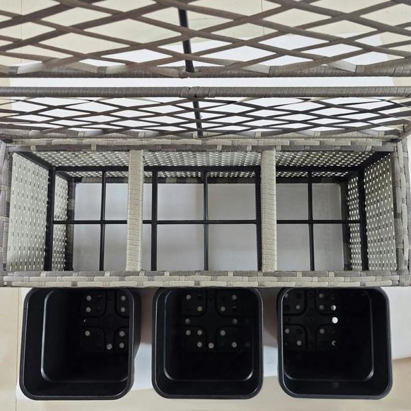 Light grey trellis planter interior with three square black plant boxes