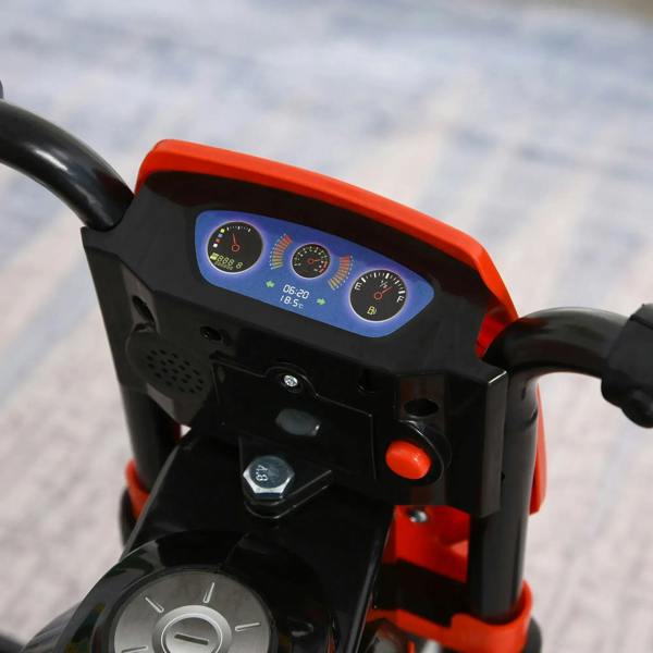 Red and black motorcycle-style trike control panel with colored gauge lights