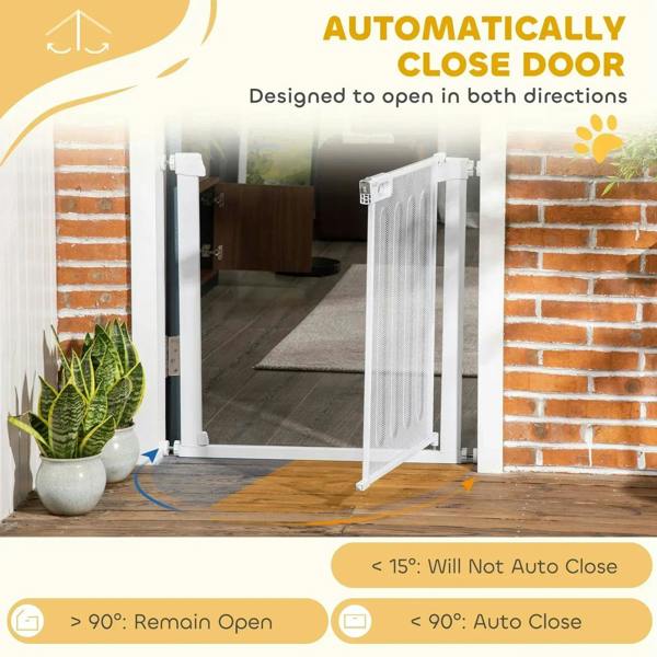 White pet safety gate with mesh door open in a doorway