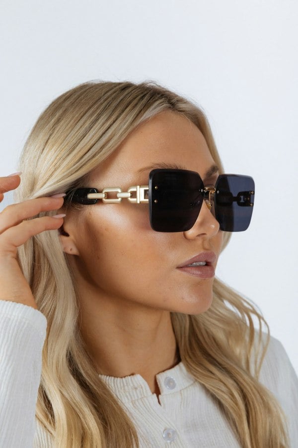 SVNX Rimless Oversized Square Sunglassses in Black Gold