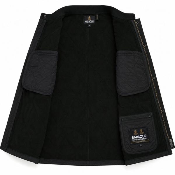 Interior view of a black Barbour International Tourer Ariel fleece-lined quilted jacket with internal pockets.