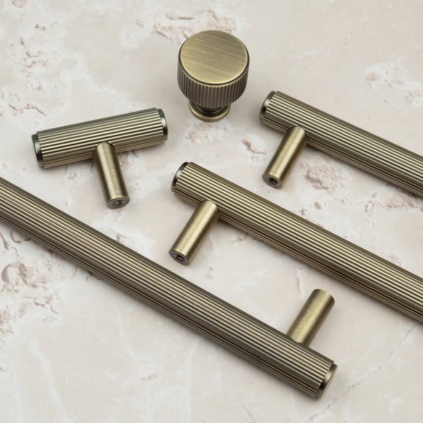 Handle & Home Antique Brass Reeded Handles and Coordinating Knobs