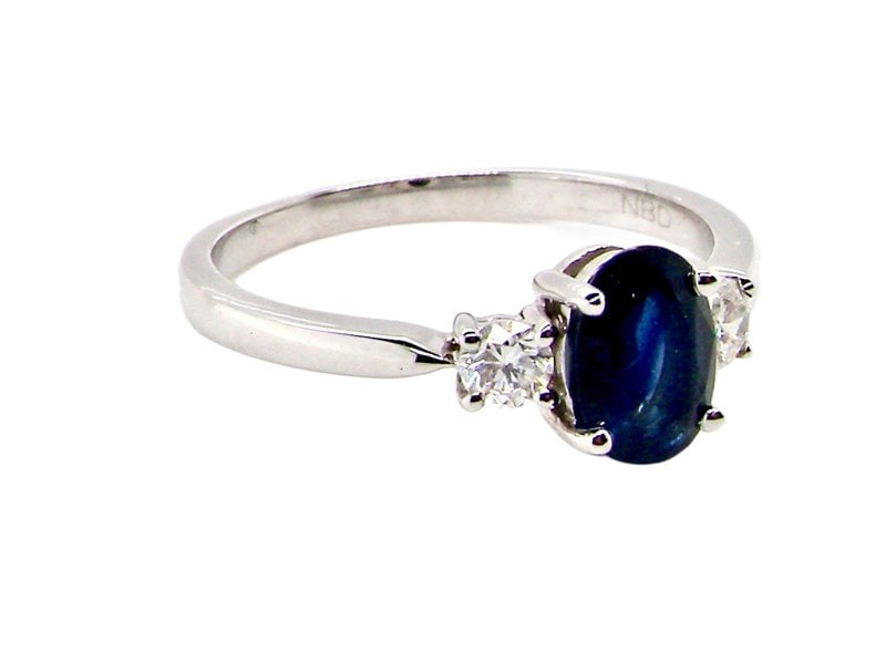 18ct white gold three stone sapphire and diamond ring