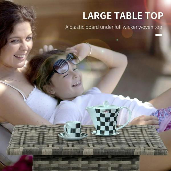 Grey woven side table with square top and cups set on top