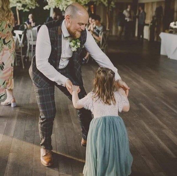 Daddy and daughter dancing