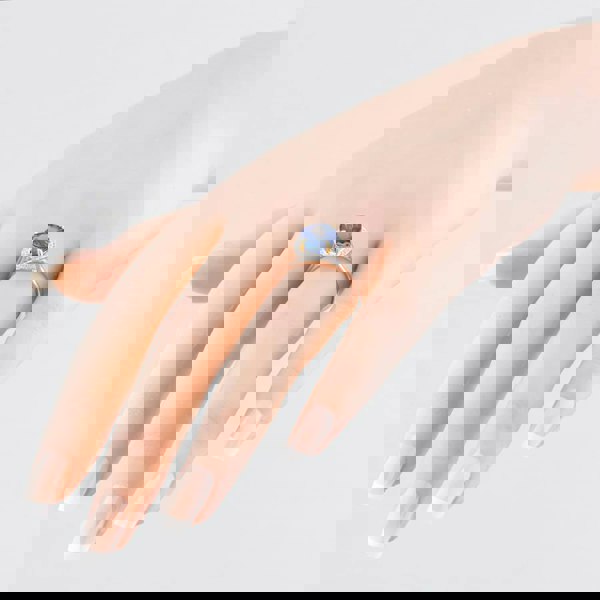 T. H. Baker 18ct White Gold 3.51ct Brilliant Cut Tanzanite & 0.12ct Diamond Halo Ring NTR2027GTZD-18YWG