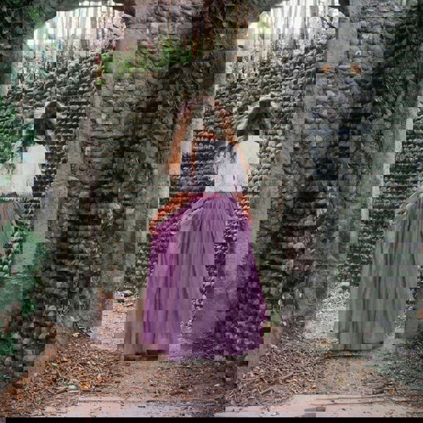 Girl wearing mauve skirt and top set