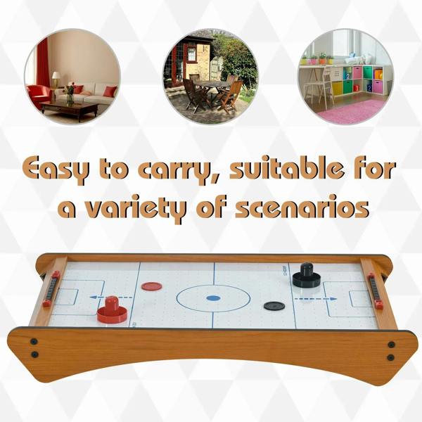 Wooden tabletop air hockey game table with red and black air hockey discs