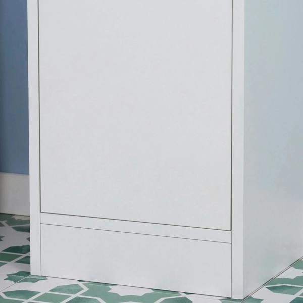White tall bathroom cabinet with lower door panel and bottom base edge