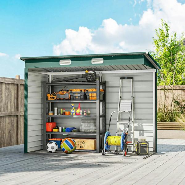 Green metal shed with open doors storing gardening tools and containers on wall shelves