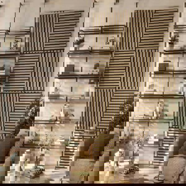 Modern living room with shelves, decorative items, and a sofa. The key feature is the oak slat wall squares