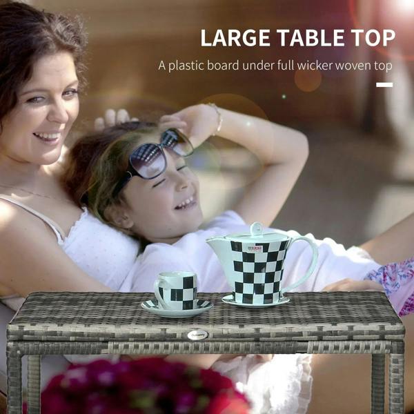 Grey woven rattan-look outdoor coffee table with plastic board under full tabletop