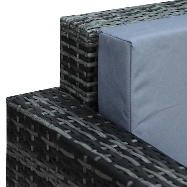 Close-up of dark woven rattan armrest and corner cushion in grey