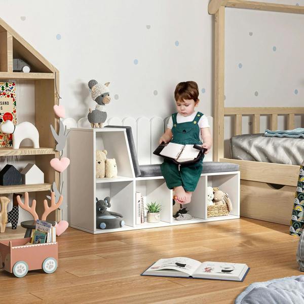White bookshelf storage unit with gray reading seat and open front cubbies