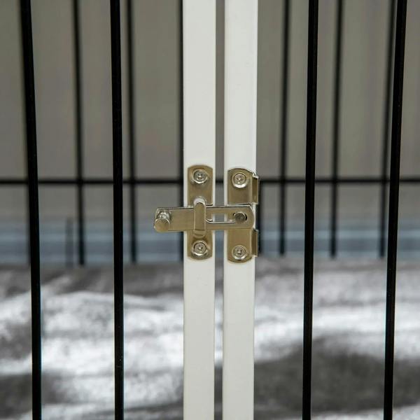 Close-up of lock latch on indoor dog crate end table door with black bars