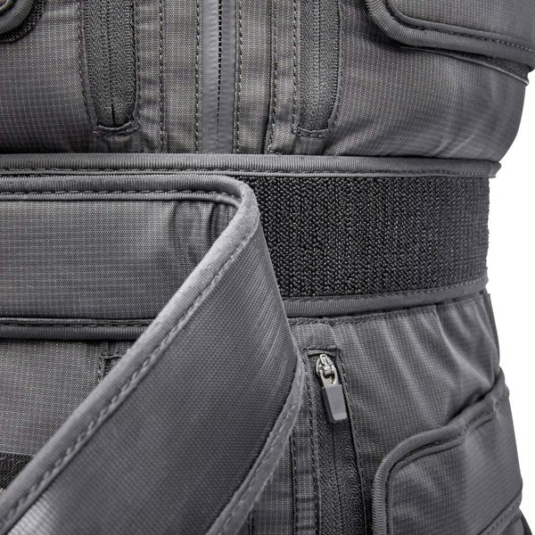 Close-up of a black adidas weighted vest with zippers and straps