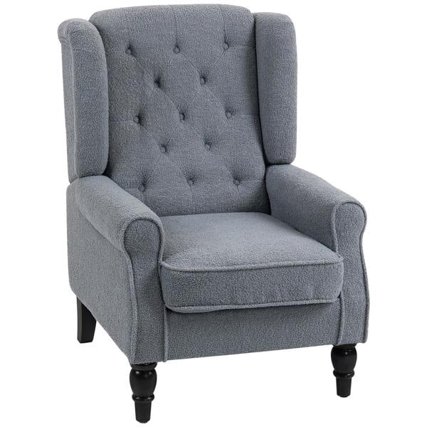 Grey wingback accent chair with button-tufted back, upholstered arms, and rolled seat