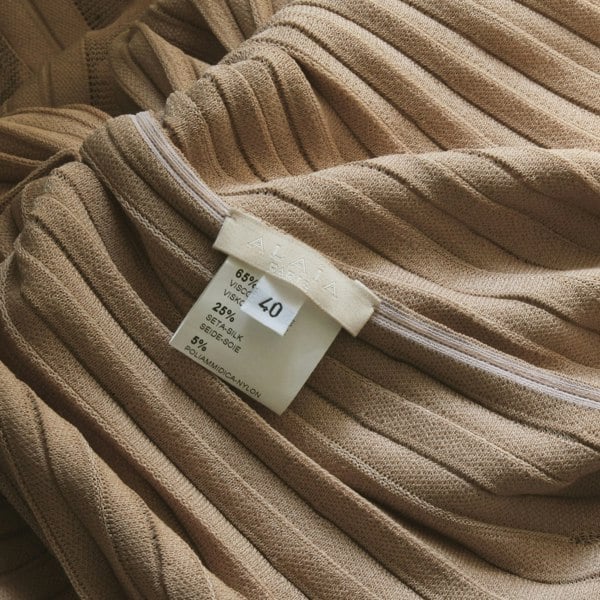 Alaia luxurious origami midi dress in a signature blush tone