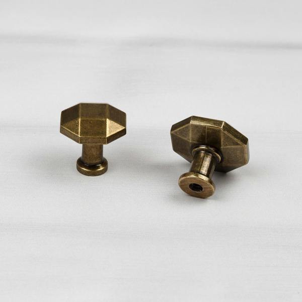Octagonal shaped antique brass knobs