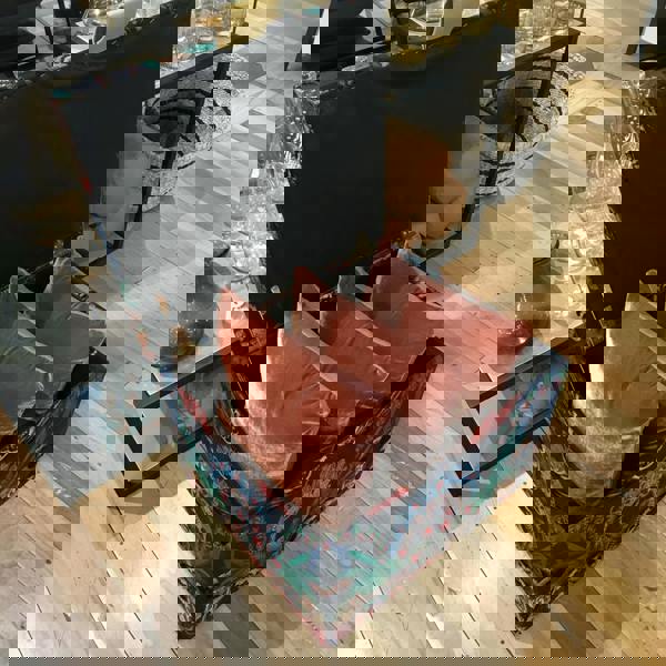 Deep buttoned square upholstered footrest UK craftsmanship
