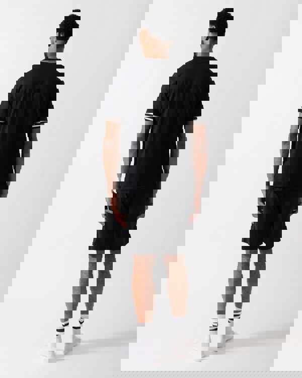 Back shot of a Model wearing a BOSS Orange Iconic Mens Loungewear T-Shirt in Black