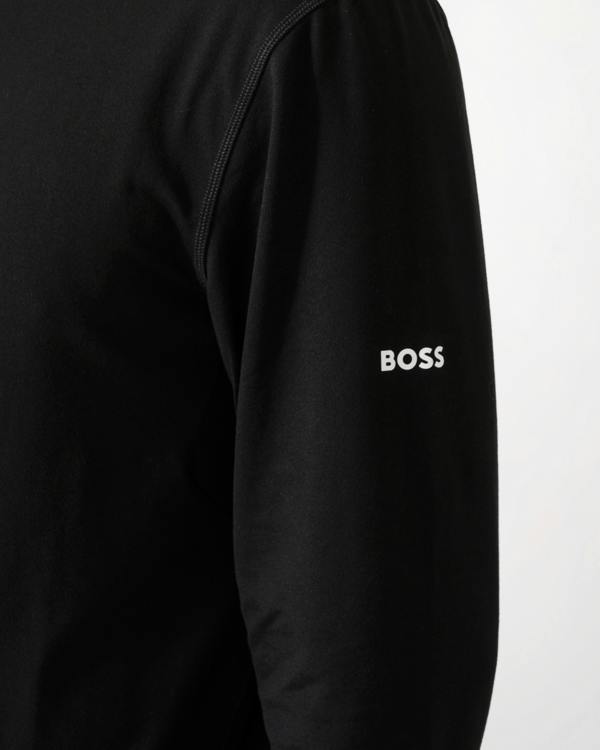 logo detail shot of model wearing a BOSS Green SW Active Mens Quarter Zip Sweatshirt in Black 001