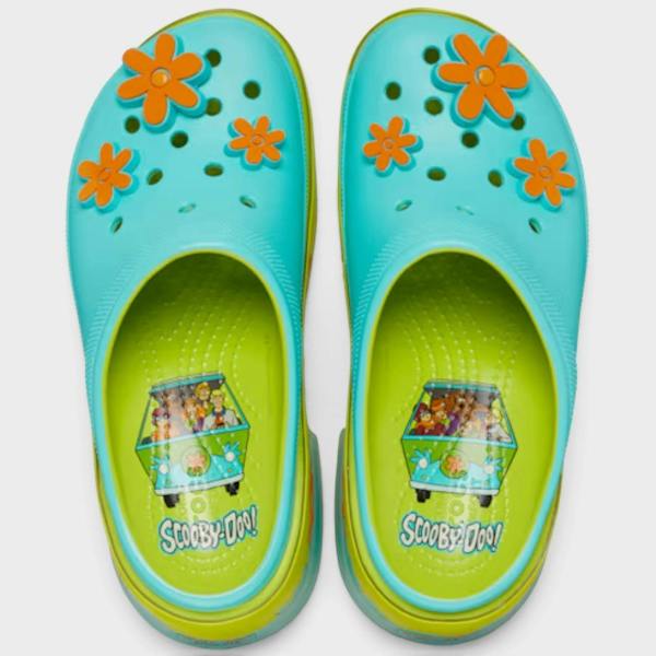 Supplied Fashion Scooby-Doo Siren platform clogs in lime punch with orange flower charms and Mystery Machine insoles.