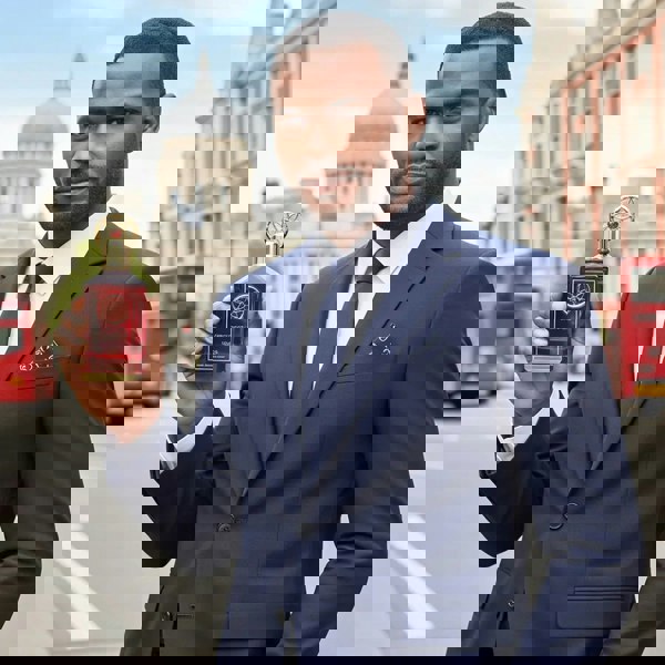 Anfar 1950 Zenit Rouge 100ml Extrait parfum held by man in suit