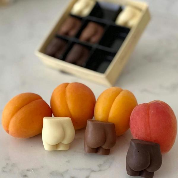 Novelty chocolate bums gift box featuring white, milk, and dark chocolate bottoms.