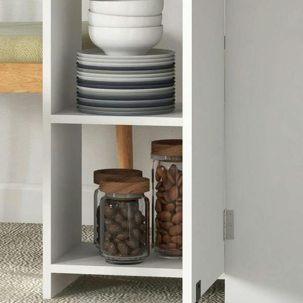 Oak storage shelves in a white table base with stacked dishes and glass jars