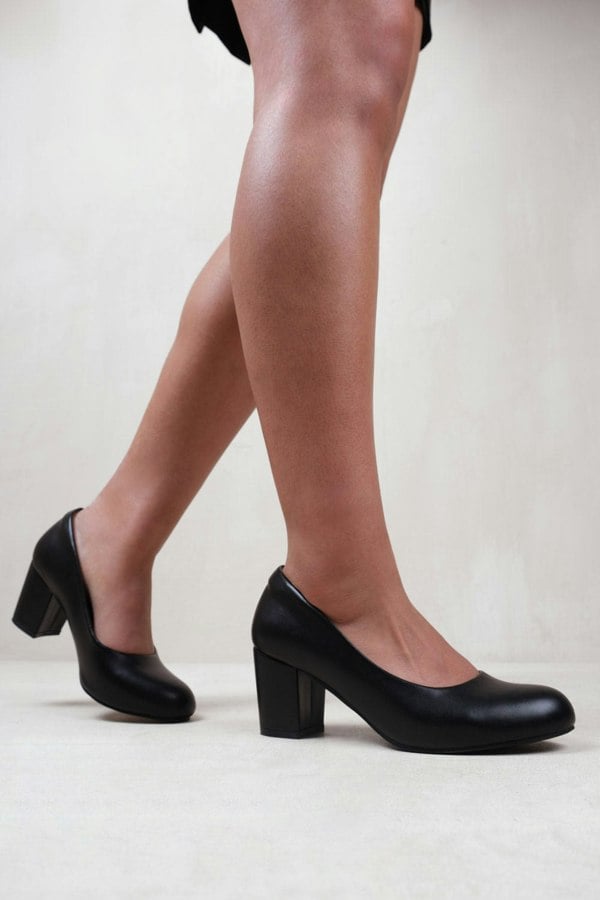 Where's That From Melrose Wide Fit Mid Block Heel Court Shoes in Black Faux Leather