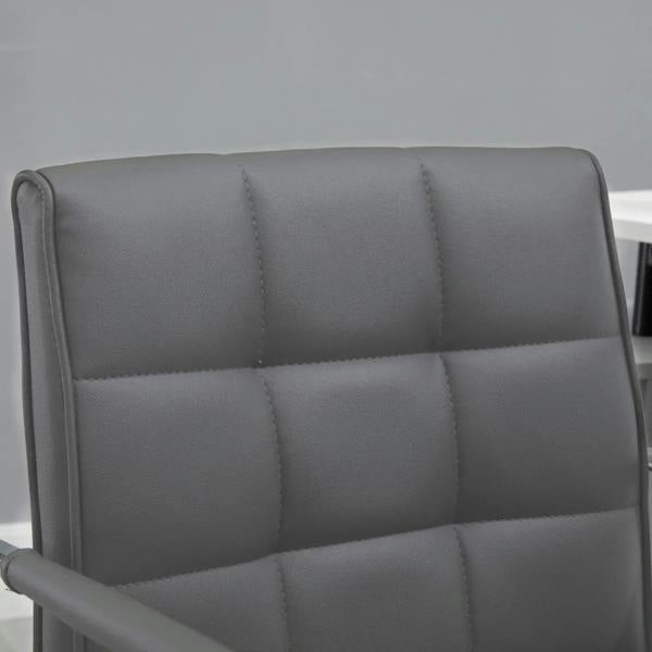 Close-up of grey mid-back office chair showing quilted faux leather upholstery