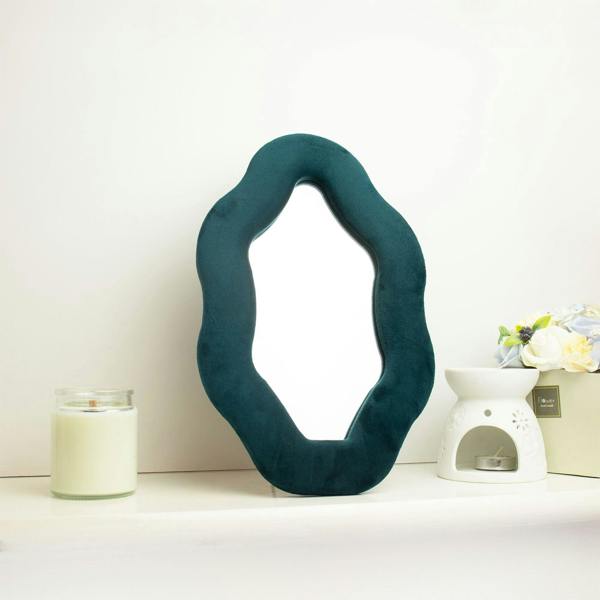 Royal teal oval squiggly wall mirror with pebble-shaped soft frame